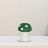 Green spotted mushroom figure for garden