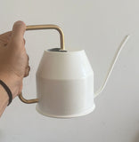 Ivory plastic watering can