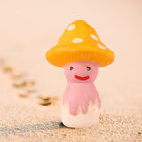 Yellow charming miniature doll