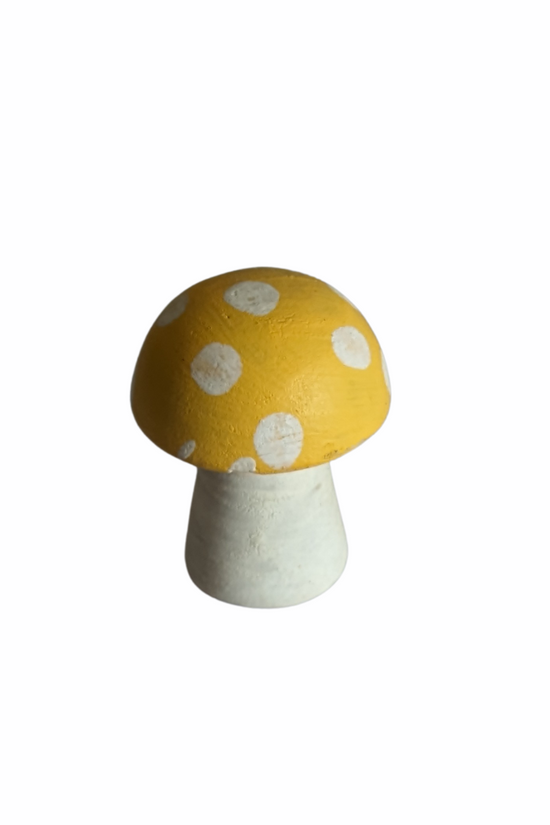 Green spotted mushroom figure for garden
