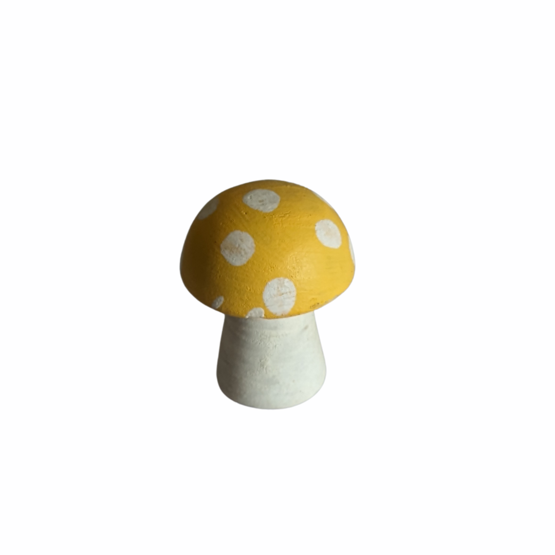 Green spotted mushroom figure for garden