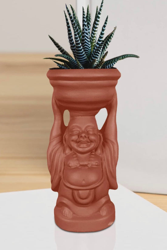 Laughing Buddha terracotta planter
