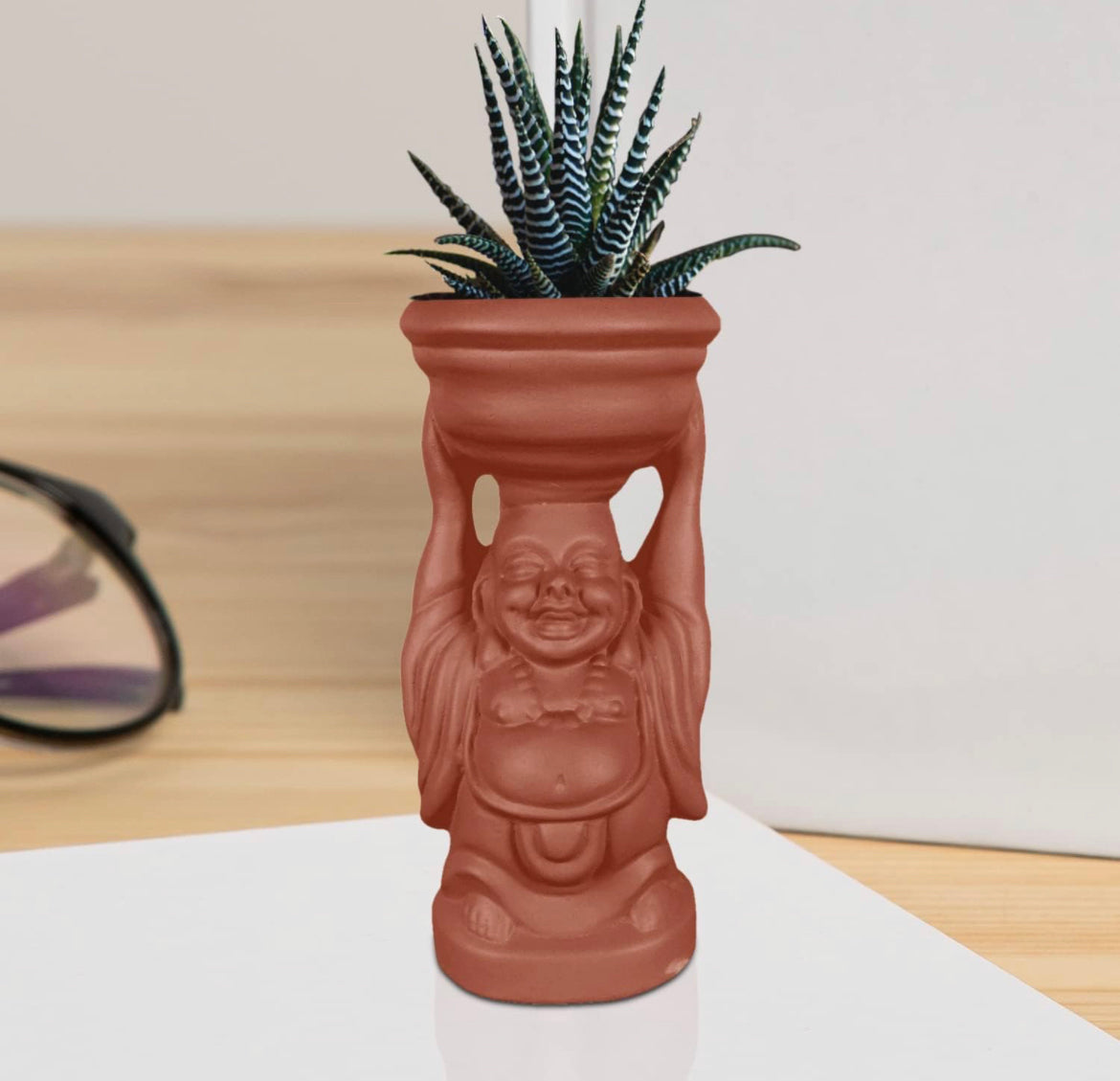 Laughing Buddha terracotta planter

