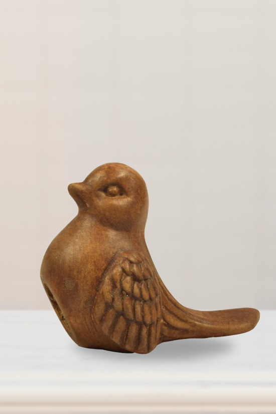 Antique miniature sparrow figurine
