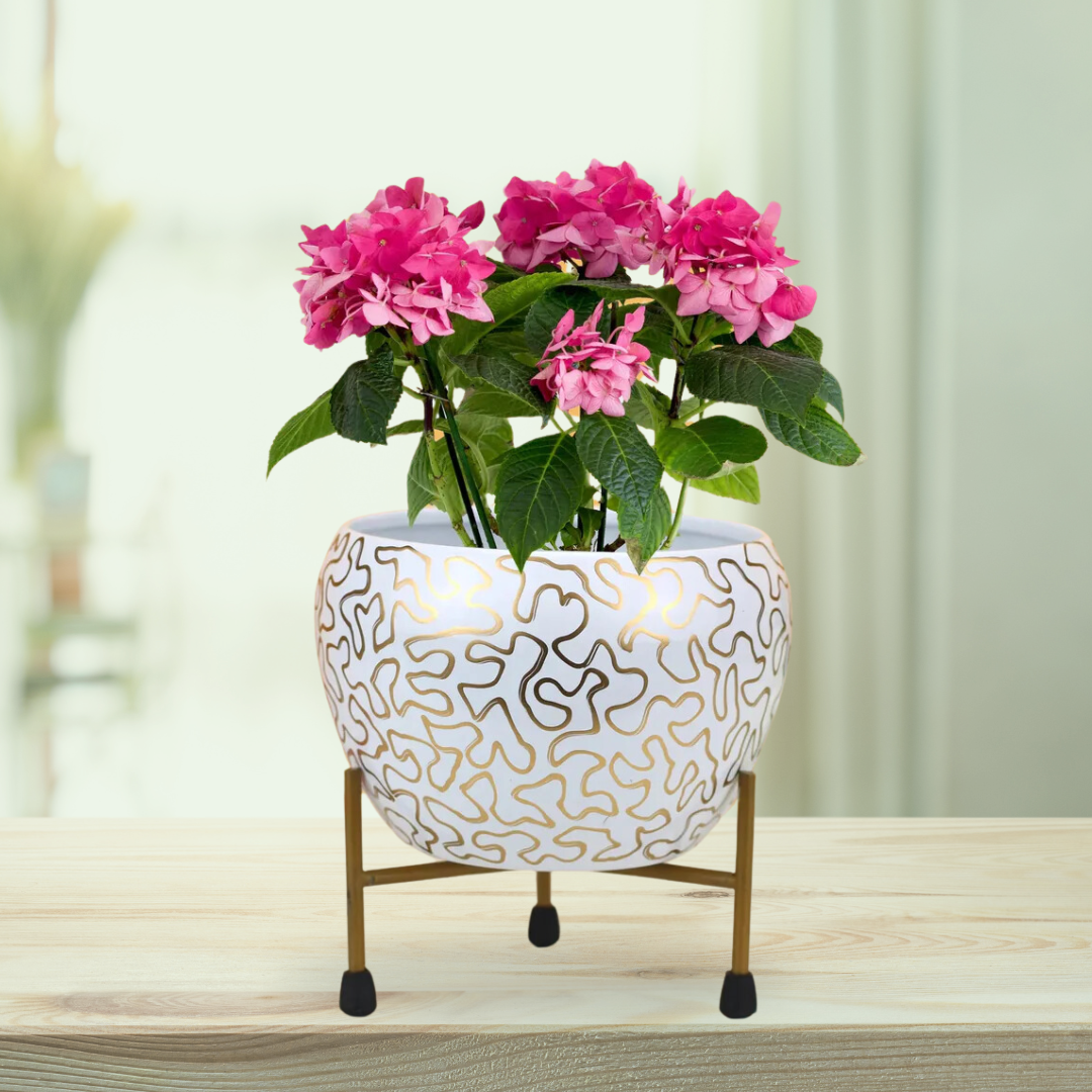 Apple-shaped decorative metal planter
