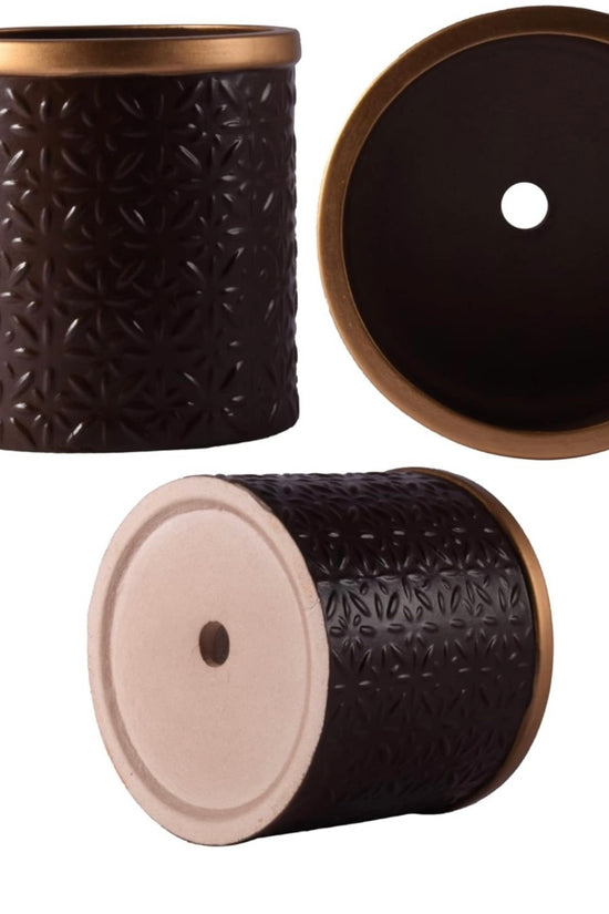 Brown and gold ceramic planter pot
