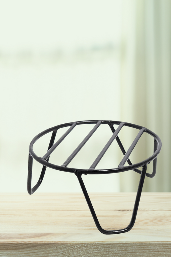 Decorative black metal pot stand
