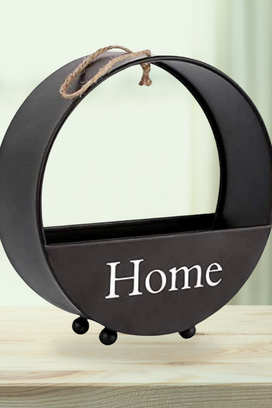 Wall-mounted circular black planter
