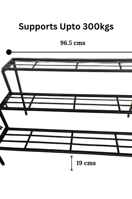 Black metal shelf with dimensions and weight capacity on a white background