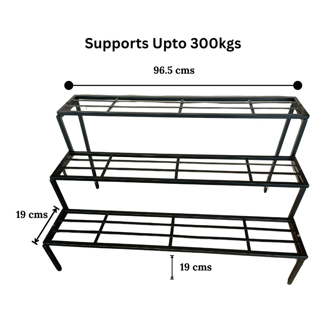 Black metal shelf with dimensions and weight capacity on a white background