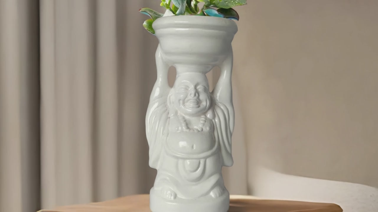 Laughing Buddha terracotta planter
