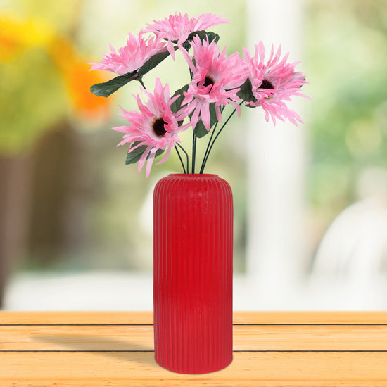 Red-colored indoor ceramic planter
