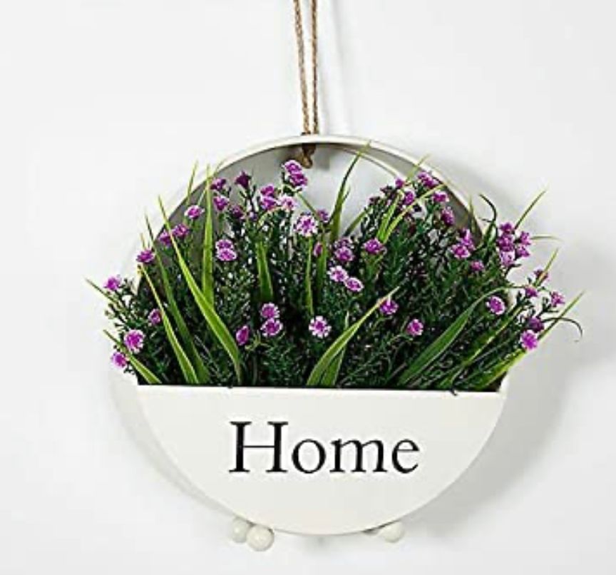 Wall-mounted circular black planter
