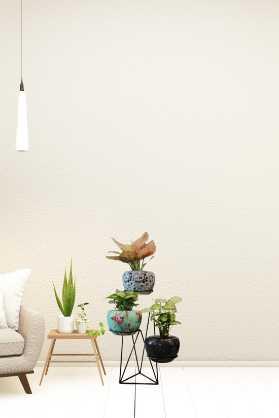 Vertical metal plant stand with pots
